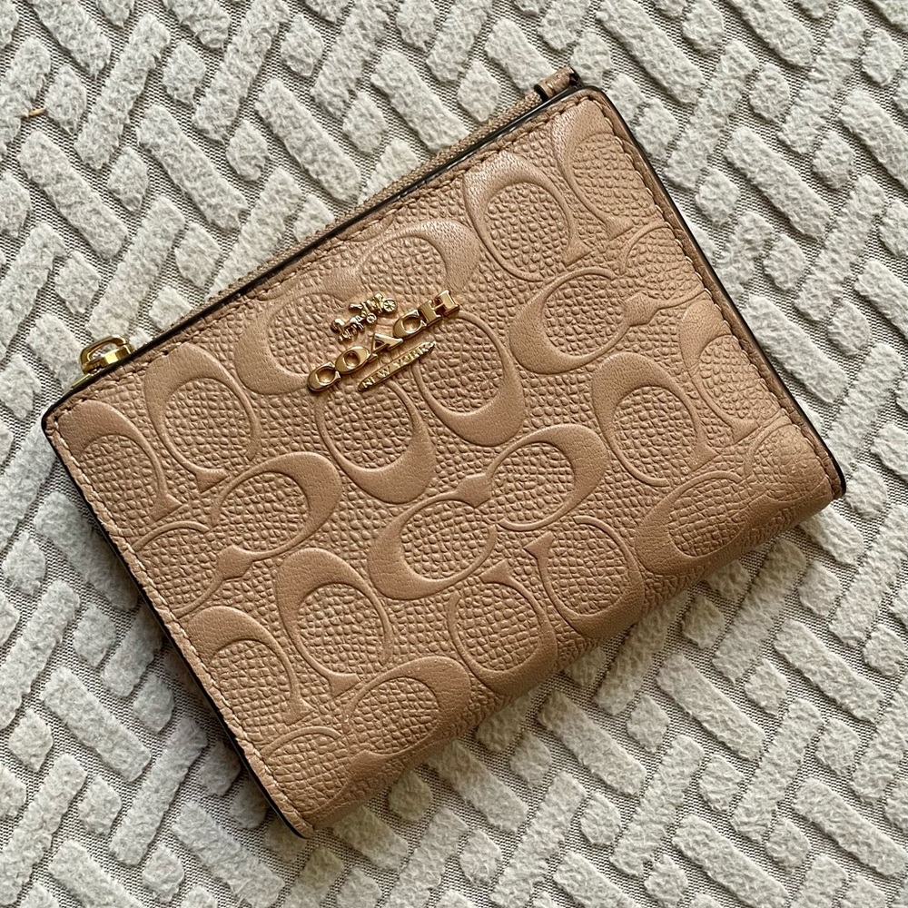 Coach embossed wallet